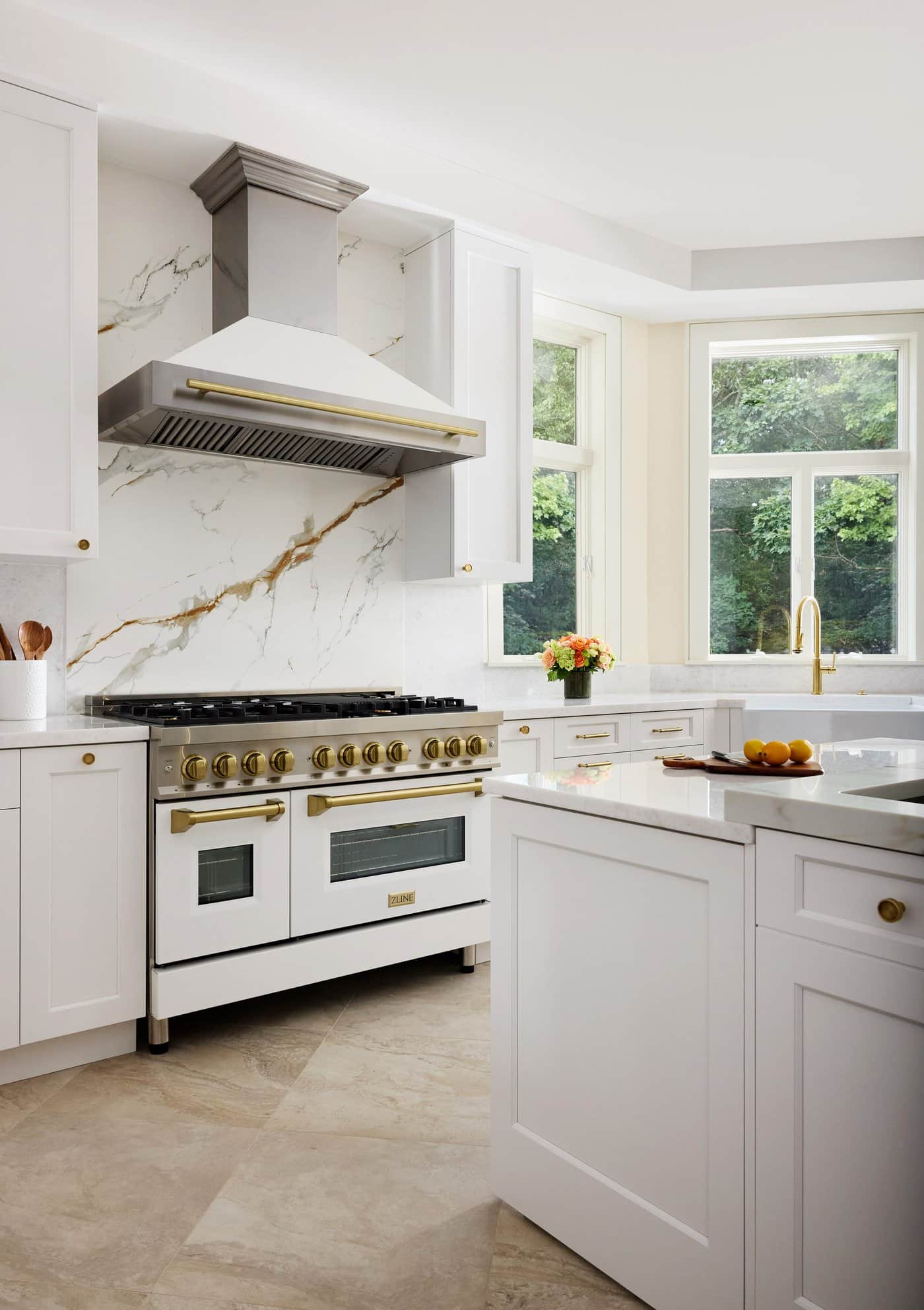 Newton Kitchens - Cutler Road kitchen range wall with white hood and marble slab backsplash